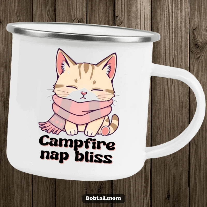 Funny bobtail cat in a scarf, napping peacefully, on a durable camping mug.