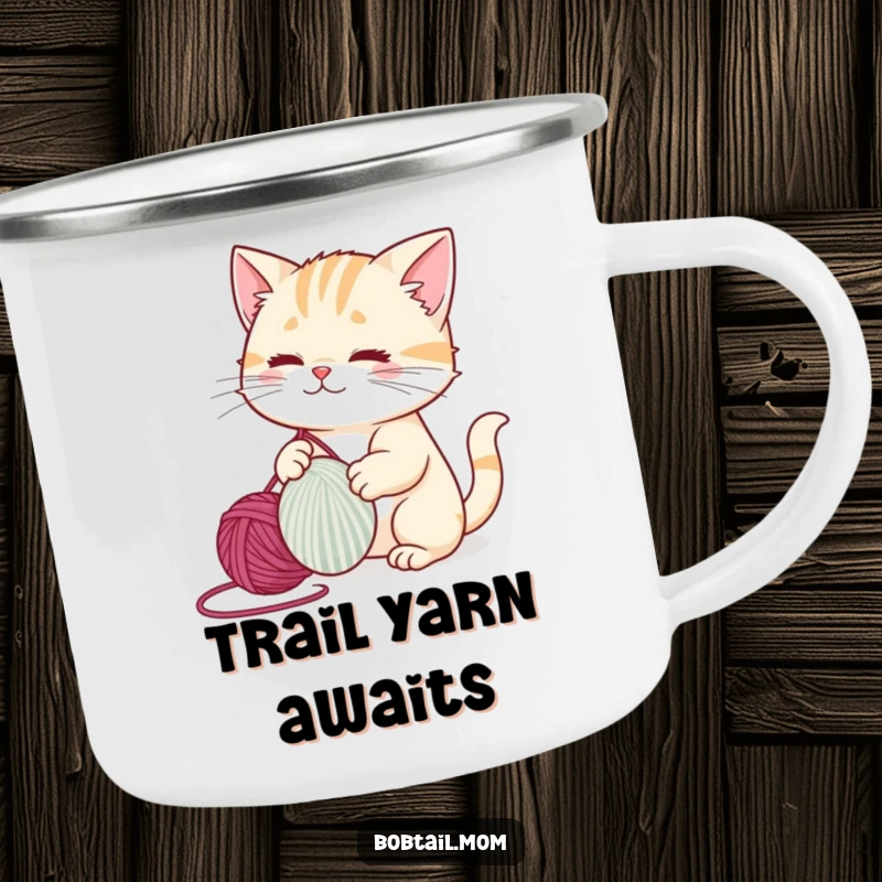 Funny bobtail cat batting a yarn ball, ready for adventure on a durable camping mug.