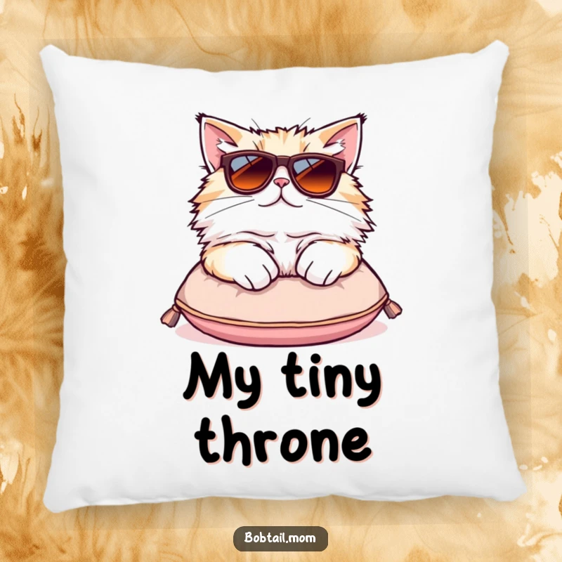 Funny Bobtail cat pillow featuring a fluffy cat in oversized sunglasses lounging on a small cushion, adding cozy humor.