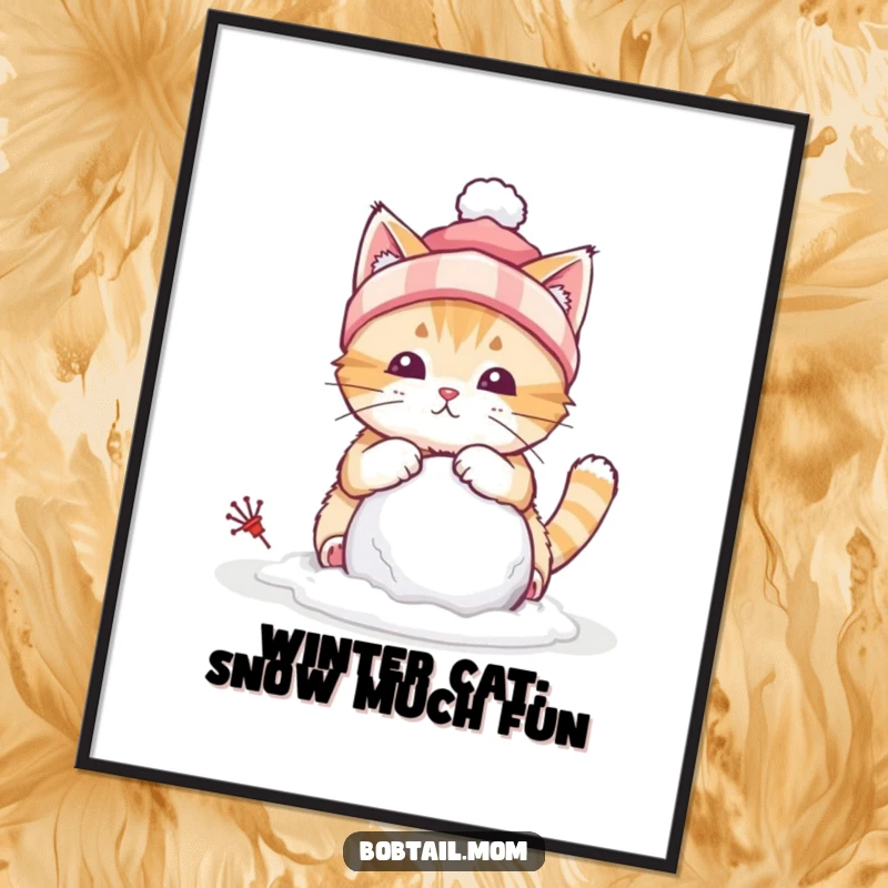 Funny Free Printable wall art of a bobtail cat wearing a winter hat, busy building a tiny snowball in a snowy setting.