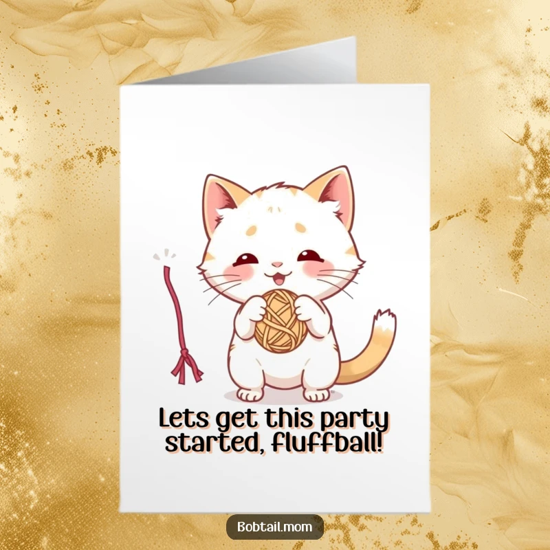 Funny Free Printable Birthday Card: A playful Bobtail cat joyfully bats at a dangling ball of yarn.