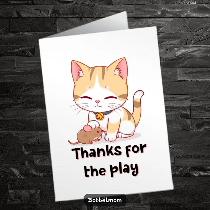 Funny Free Printable Thank You Card: Playful Bobtail cat with bell collar nudging a toy mouse, sending thanks.
