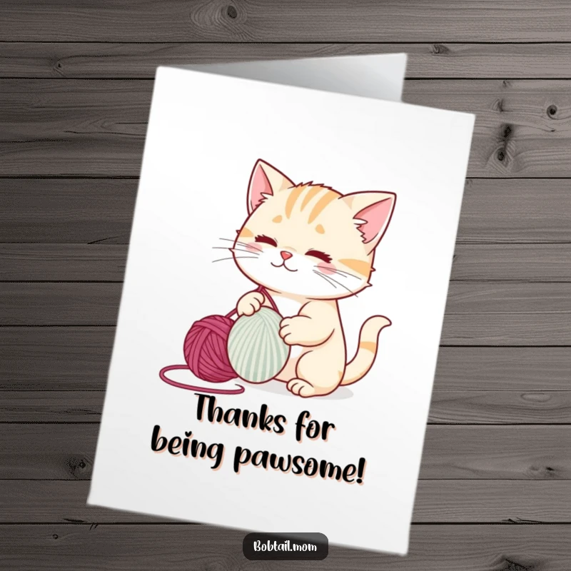 Funny Free Printable Thank You Card: A cute bobtail cat eagerly playing with a ball of yarn.
