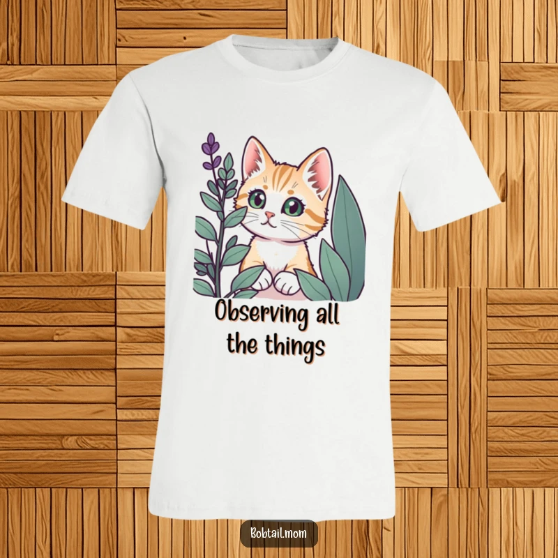 Funny Bobtail cat with big, curious eyes peeking from behind a leafy green plant on this t-shirt.