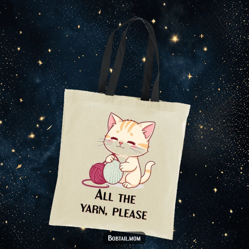 Funny bobtail cat completely engrossed in playing with a large ball of yarn, a charming shopping tote.